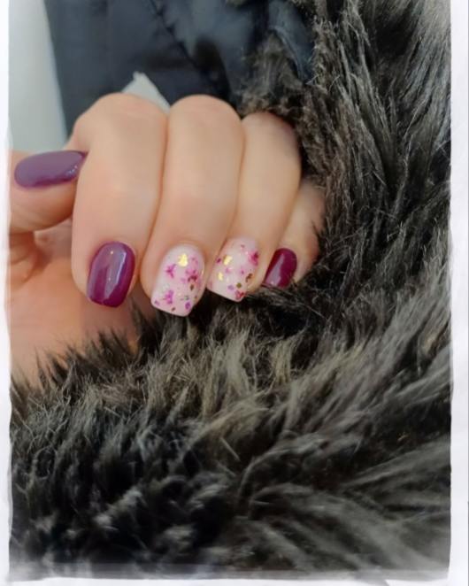 Nails with intricate gel art design