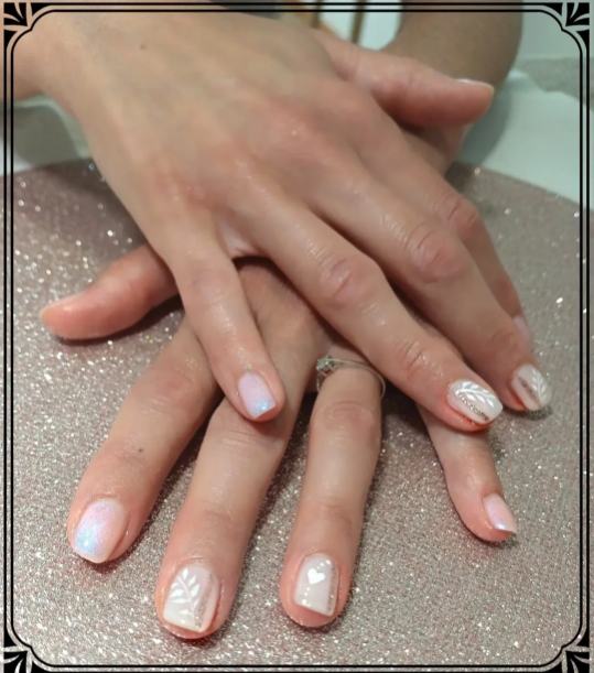 Nails with intricate gel art design