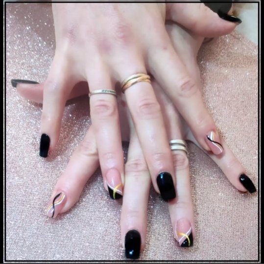 Nails with intricate gel art design