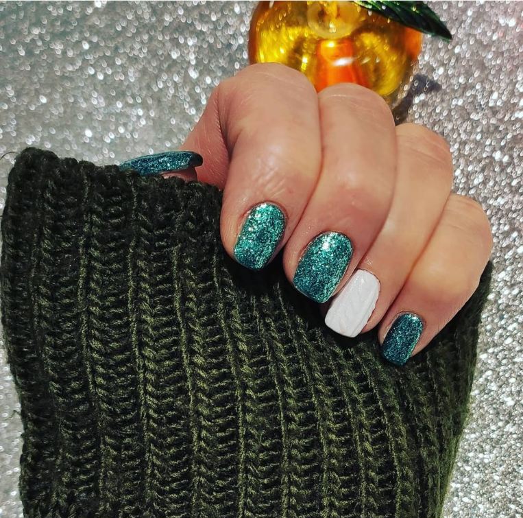 Nails with intricate gel art design