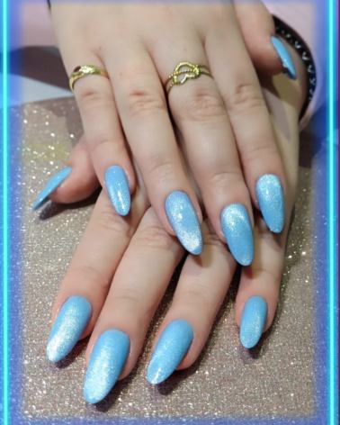 Nails with intricate gel art design