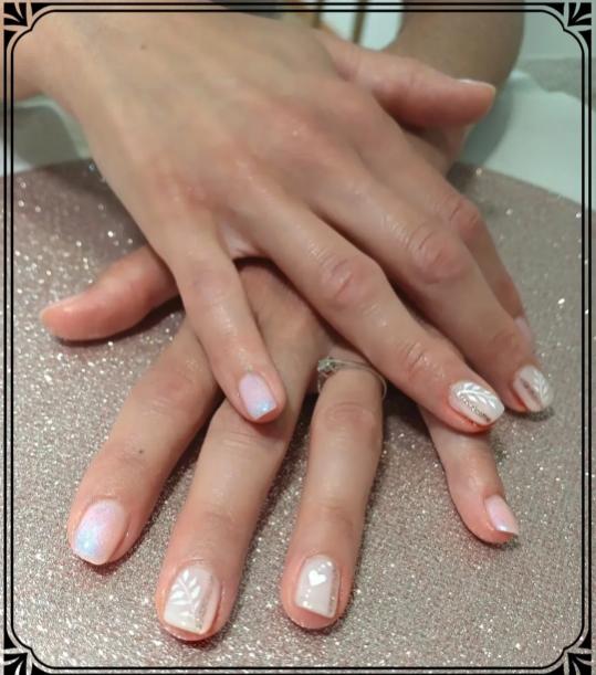 Nails with intricate gel art design