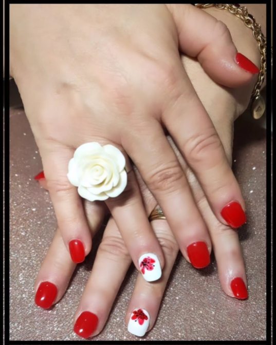 Nails with intricate gel art design