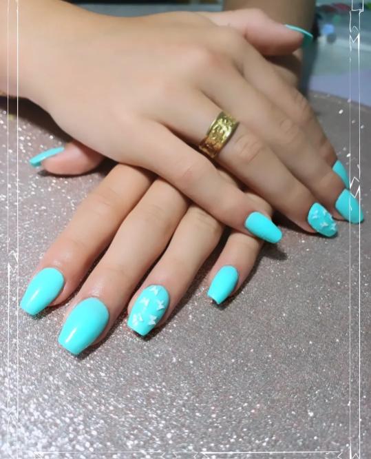 Nails with intricate gel art design