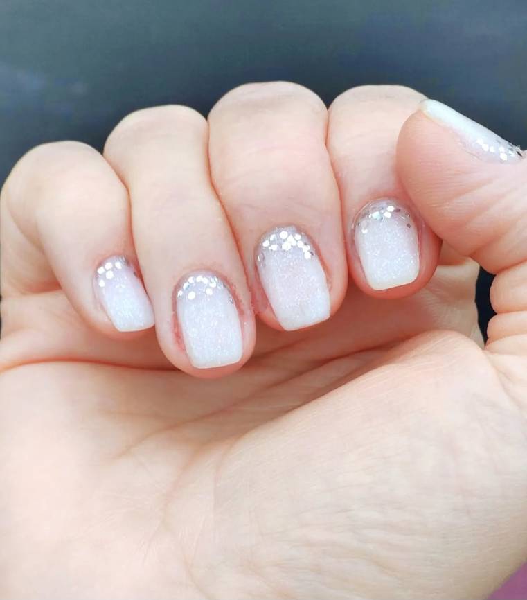 Nails with intricate gel art design