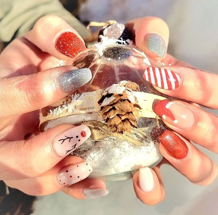 Nails with intricate gel art design