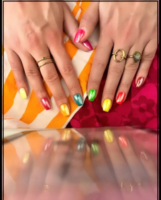 Nails with intricate gel art design