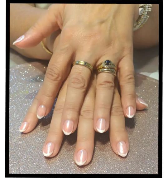 Nails with intricate gel art design